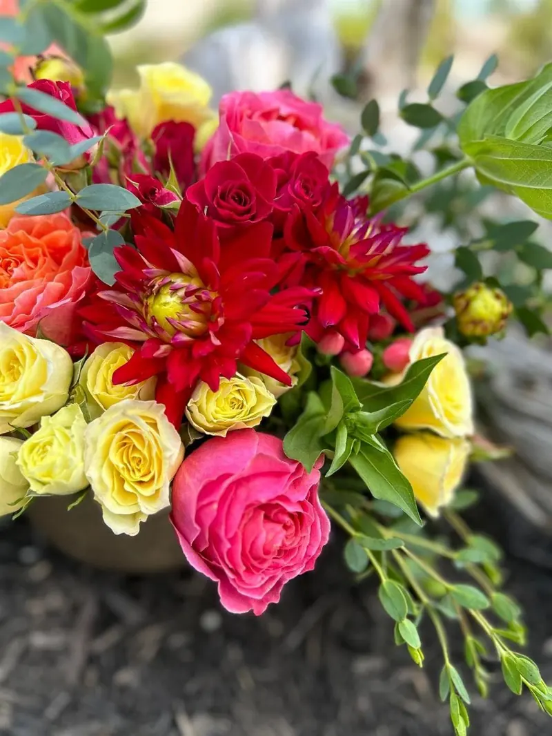 Colorful mixed seasonal arrangement by Vintage Blooms KC